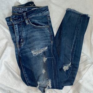Distressed cropped skinny jeans